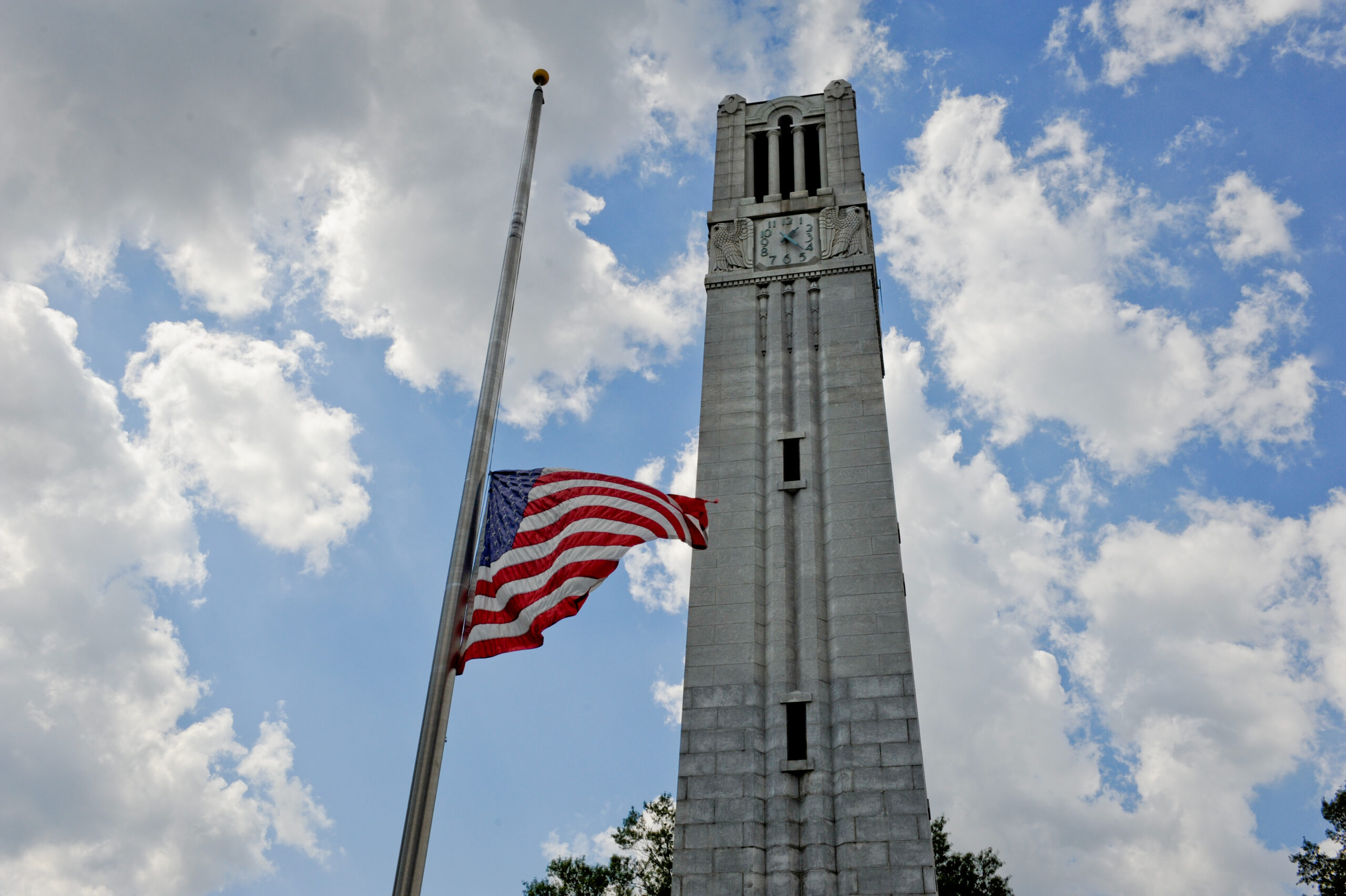 The flag flies at half-mast in front of the NCSU Belltower on the 10th anniversary of 9/11.